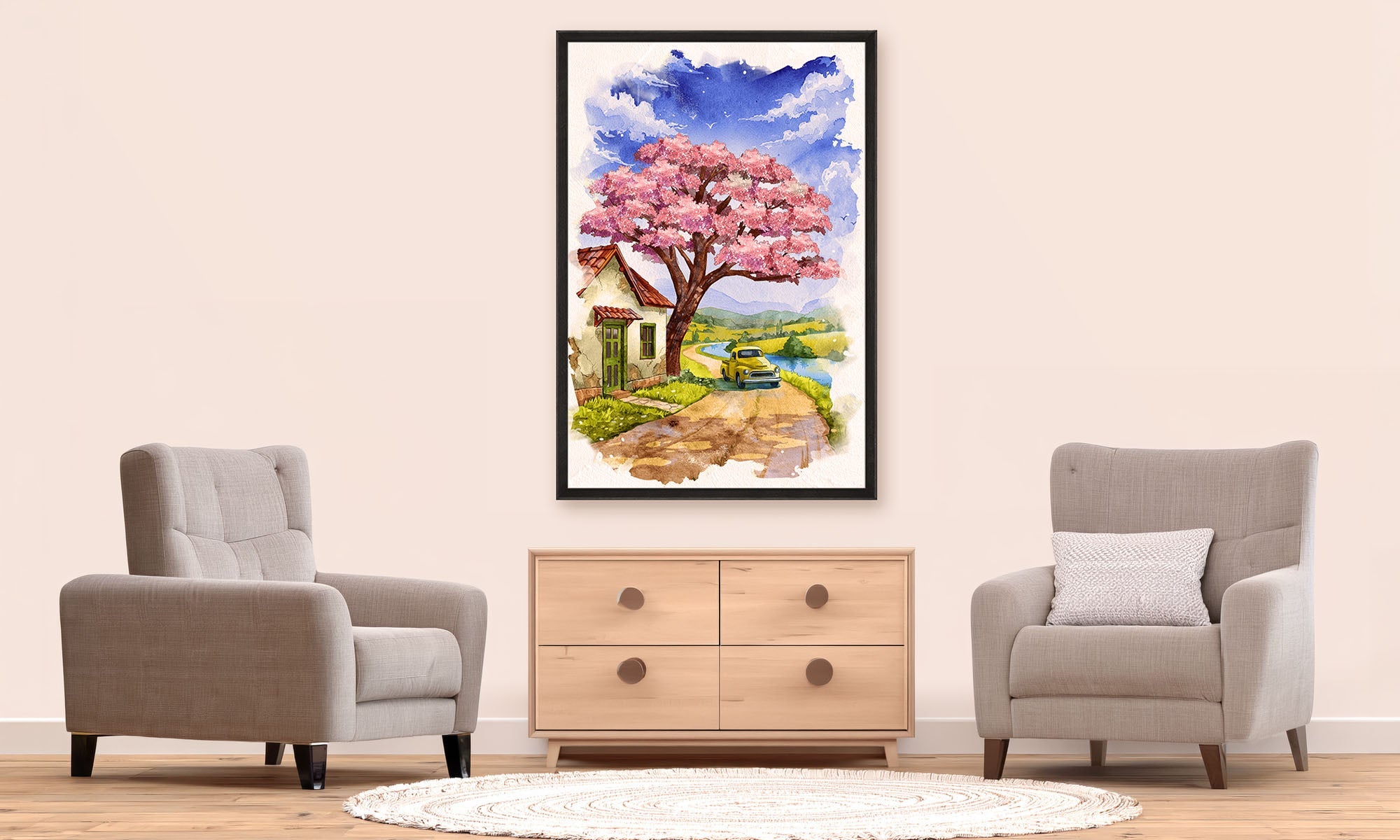 Living room with two gray armchairs and a wooden cabinet, featuring a framed artwork of a cherry blossom tree.