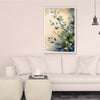 Living room with a white sofa, coffee table, and wall art of leaves.