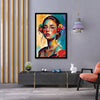 Modern interior with a colourful painting of a woman on the wall, a pink chair, and a coffee table.