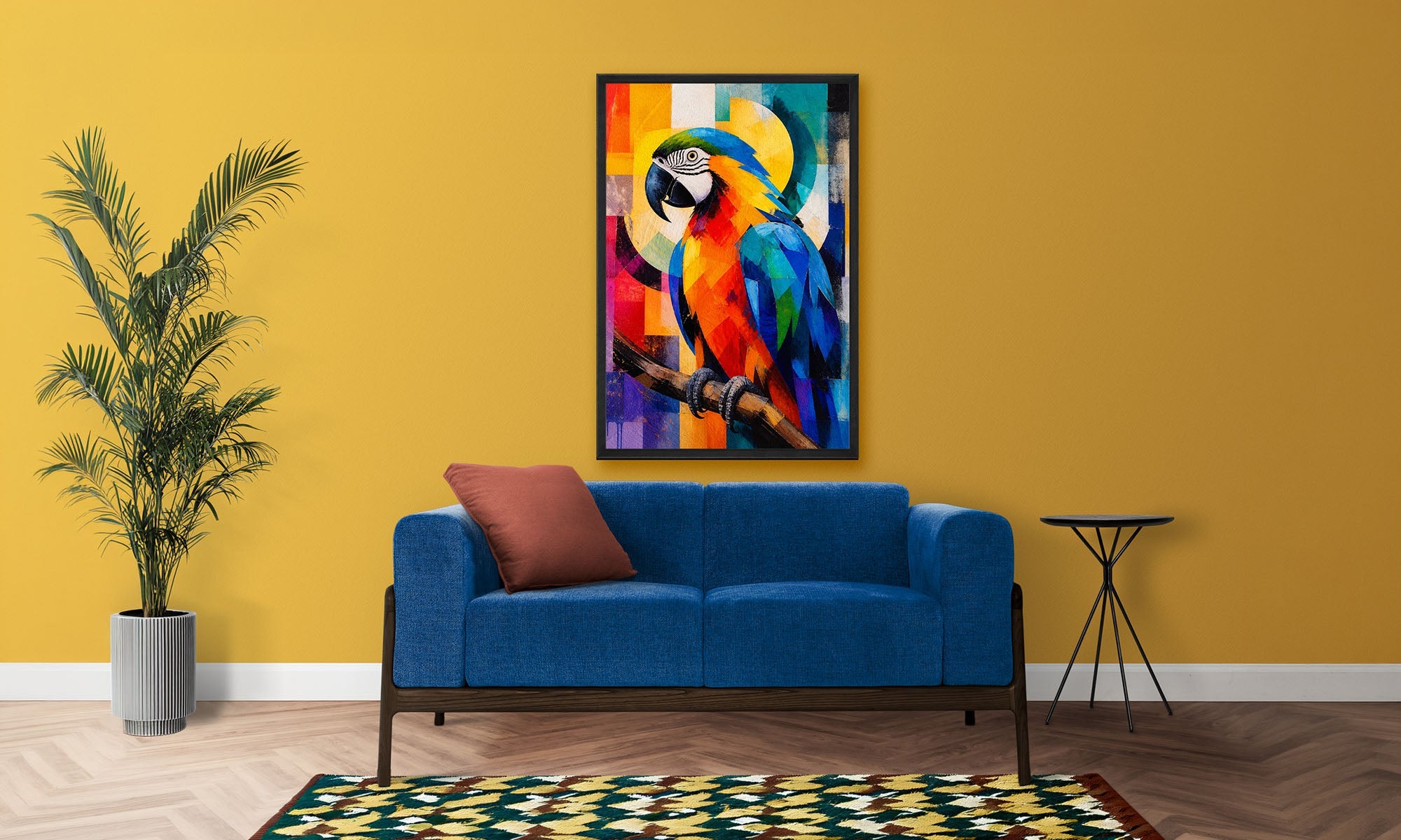 Living room with a blue sofa, colourful parrot /macaw painting, and plant on a yellow wall.