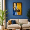 A framedGold canvas wall art print featuring a vintage car, displayed on a blue wall above a cream-colorued sofa in a modern living room setting.