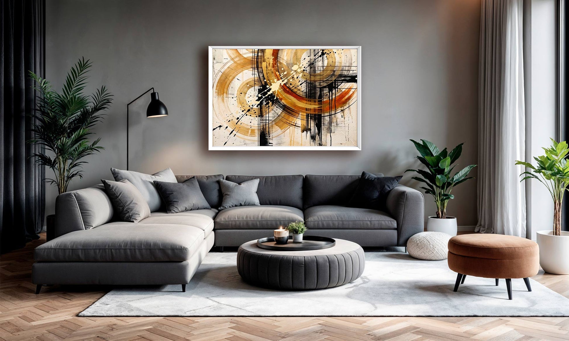 A modern living room featuring a large framed abstract canvas print with gold, black, and white brushstrokes on a gray wall above a gray sectional sofa.