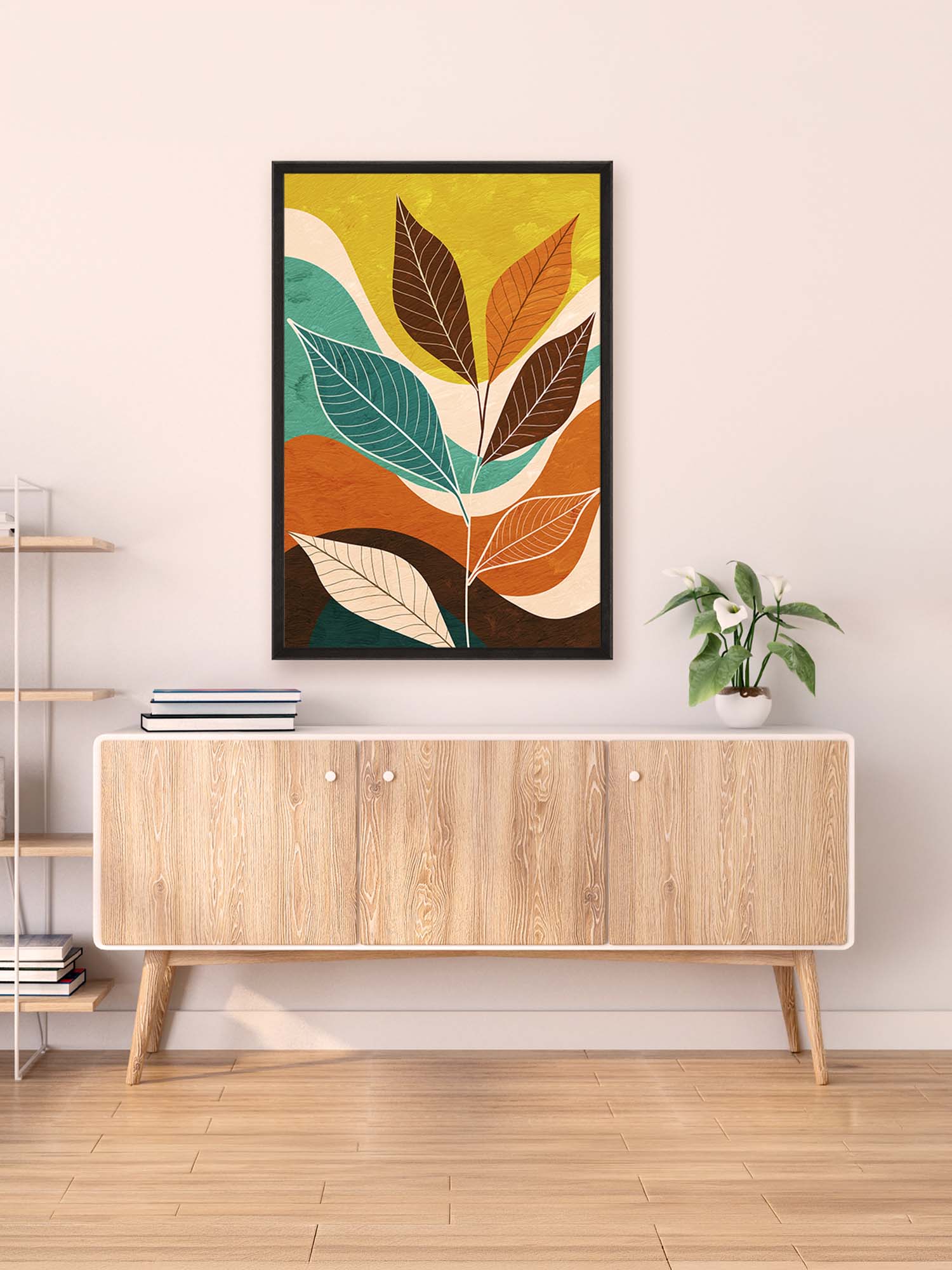 Colorful abstract leaf art on a wall above a wooden cabinet.