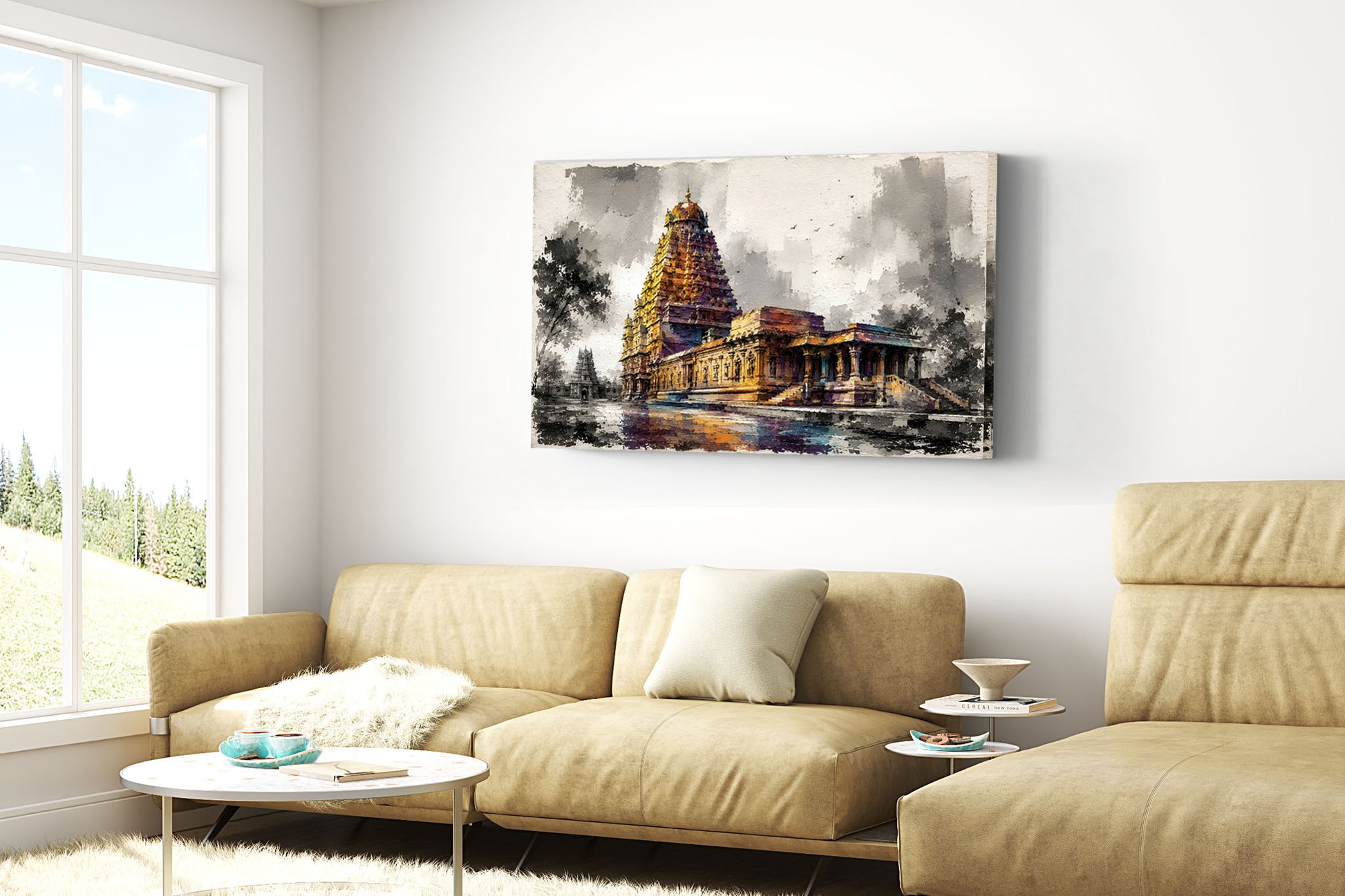 A rectangular canvas wall art print depicting a Brihadeeswara temple gopuram under a cloudy sky, displayed on a white wall above a beige fabric sofa in a modern living room setting.