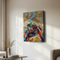 A colorful abstract canvas wall art print depicting a steaming coffee cup, displayed on a beige wall in a modern living room setting.