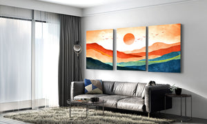 Countryside mountain canvas wall art featuring a colourful village road, charming homes, green fields, and majestic mountain scenery.