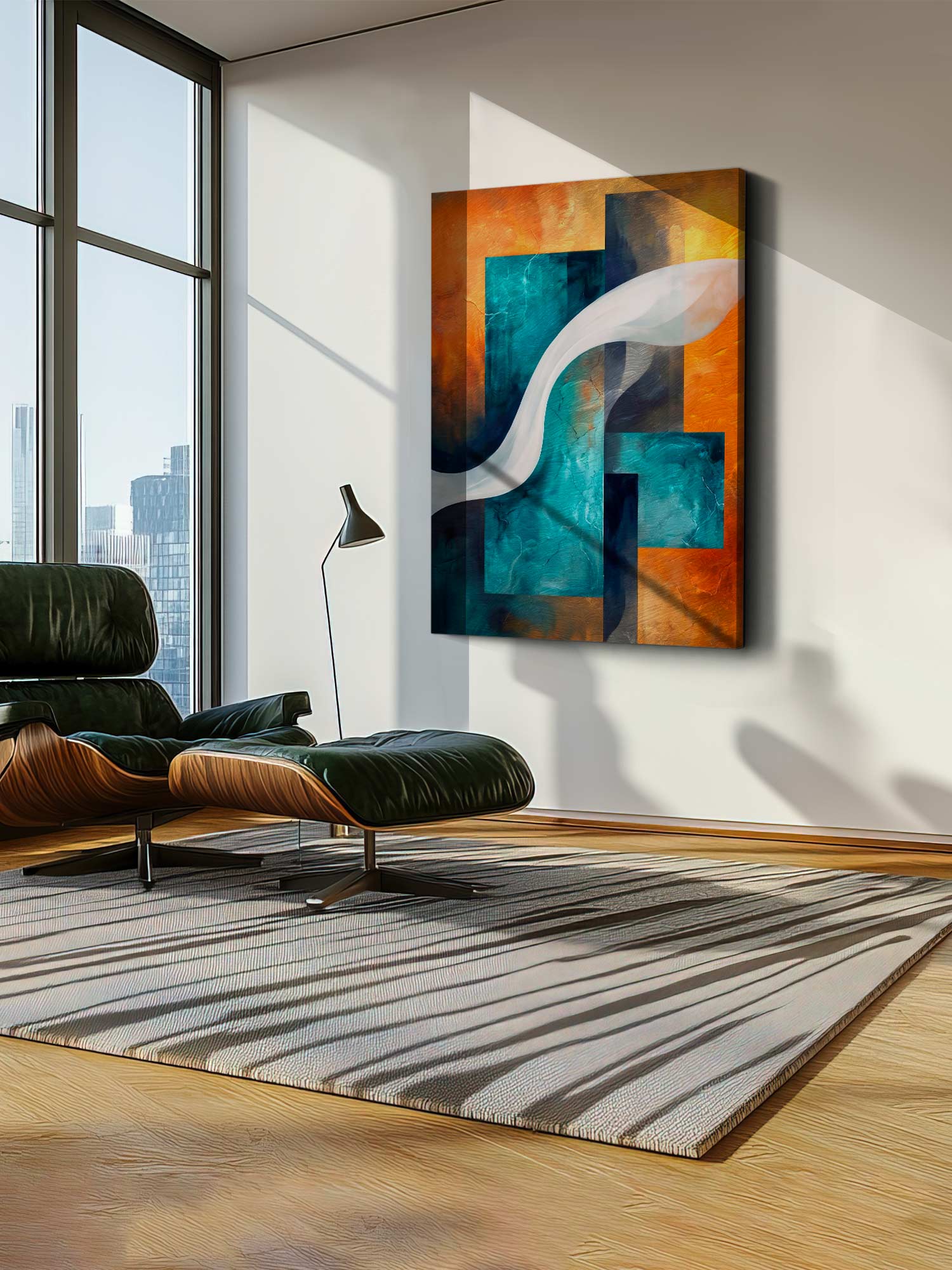 Abstract canvas wall art with geometric shapes in teal, orange, brown, and white, displayed on a white wall in a modern living room setting with a green lounge chair and striped rug.