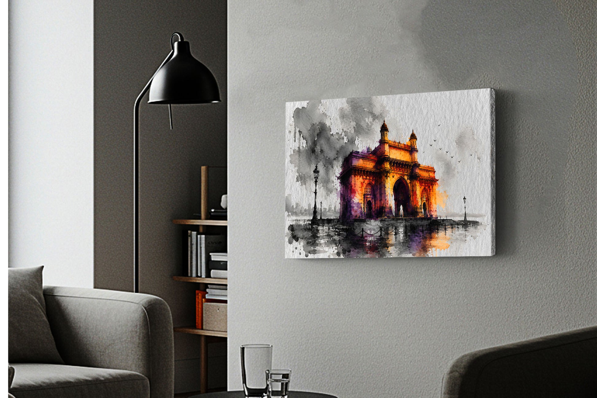 A rectangular canvas wall art print depicting a stylized illuminated monument in orange, yellow, purple, and black tones, mounted on a light gray wall in a modern living room setting with a black floor lamp, gray sofa, and shelving visible.