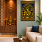A framed gold and blue wall art print depicting a Krishna deity, styled in a modern living room next to a beige sofa and a wooden altar.