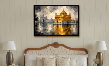 A framed art print depicting the Golden Temple in Amritsar, displayed on a beige paneled wall above a bed with pillows and bedside lamps.