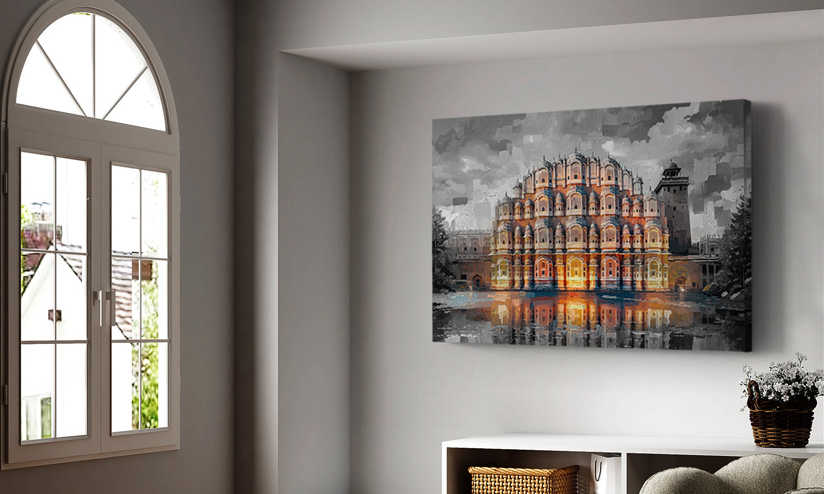 A rectangular canvas wall art print depicting a brightly lit historic building reflected in water, displayed on a light gray wall in a modern room setting next to an arched window.