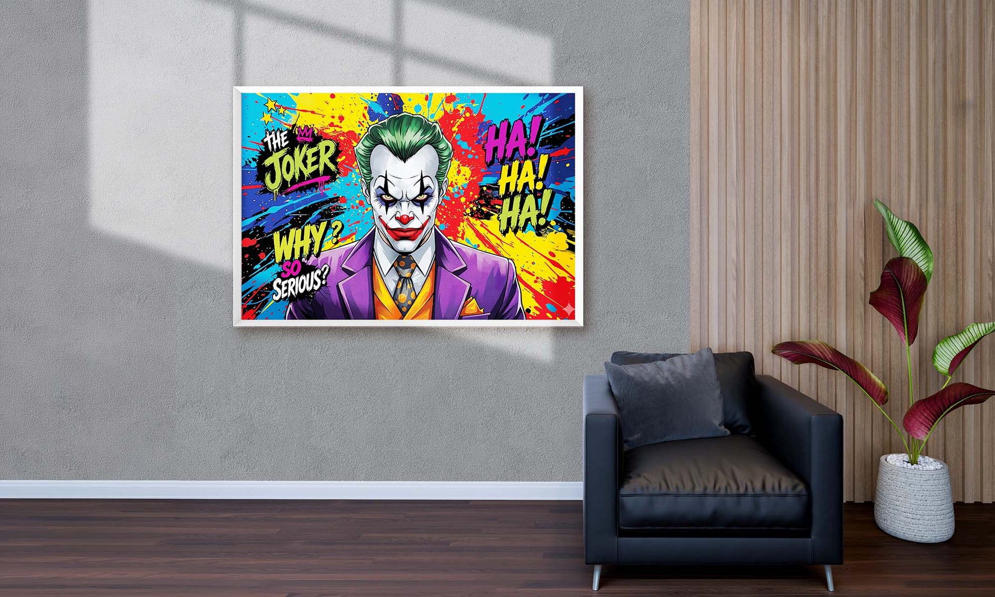 Colorful 'The Joker' poster on a wall above a dark gray armchair.