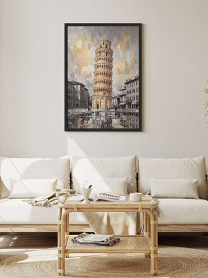 A framed art print of the Leaning Tower of Pisa hangs on a light beige wall above a white sofa in a modern, sunlit living room.