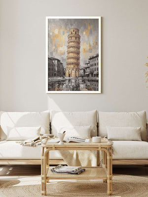 A framed art print of the Leaning Tower of Pisa hangs on a light gray wall above a white sofa in a modern, minimalist living room setting.