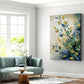 Living room with a teal sofa, round coffee table, and a elegant leaf painting on the wall.