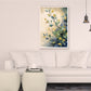 Living room with a white sofa, coffee table, and wall art of leaves.