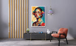 Modern living room with a colorful abstract painting of a woman, a side table with decorative items, and a chair.