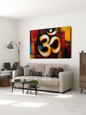 Living room with a gray sofa, coffee table, and wall art featuring an Om symbol.