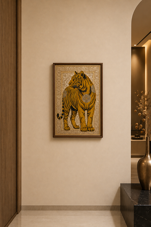 A framed art print of a golden tiger with black stripes on a textured beige background, hanging on a warm beige wall in a modern hallway.