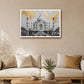 A framed art print of the Taj Mahal with gold leaf accents, displayed on a beige wall above a modern white sofa in a styled living room.