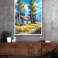Framed painting of a rustic cabin in nature above a wooden cabinet.
