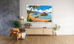 Framed beach scene painting on a wall above a wooden console table.