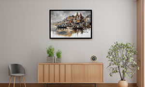 A framed art print depicting a scenic harbor city with boats and reflections, displayed on a light gray wall above a wooden sideboard in a styled room setting.